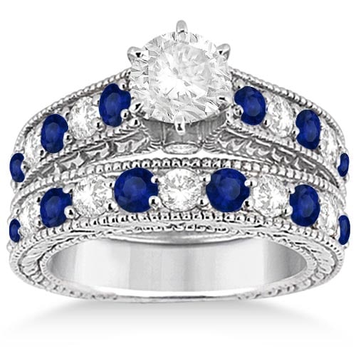 Antique style Diamond and Sapphire Bridal Ring Set in Platinum 2.87ctw: CENTER STONE 1.00 Ctw ; Blue Sapphire CENTER STONE CLARITY; Eye Clean CENTER STONE COLOR; Blue CENTER STONE SETTING; Bead SIDE STONE CLARITY; SI1-SI2,SI1-SI2 SIDE STONE COLOR; J-K,J-K SIDE STONE