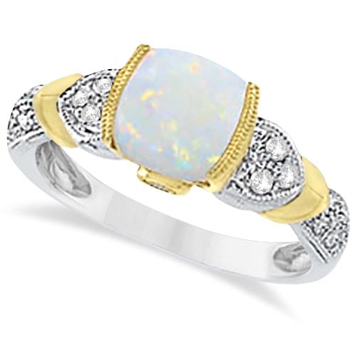 Tanzanite, Diamond and Opal Ring 14k Two-Tone Gold 1.10ctw: CENTER STONE; Opal,Tanzanite CENTER STONE CLARITY; CENTER STONE COLOR; White,Pink CENTER STONE SETTING; Semi-bezel,Bezel SIDE STONE CLARITY; SI SIDE STONE COLOR; J-K SIDE STONE SETTING; Pinpoint ctw