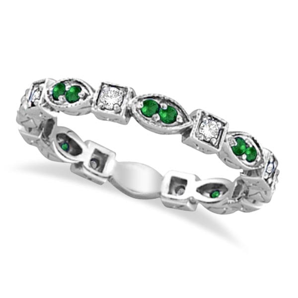 Emerald and Diamond Eternity Ring Anniversary Band 14k White Gold: CENTER STONE; Diamond CENTER STONE CLARITY; SI CENTER STONE COLOR; J-K CENTER STONE SETTING; Prong SIDE STONE CLARITY; SIDE STONE COLOR; Green SIDE STONE SETTING; Prong ctw OF SIDE STONE: 0.20 SIDE ST