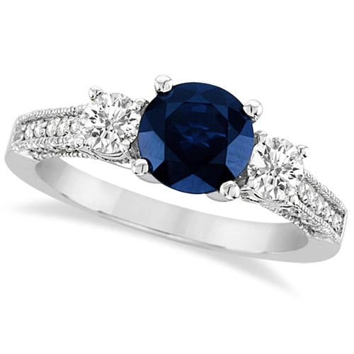 Vintage Style Milgrain Diamond and Blue Sapphire Ring 14k White Gold 2.32ct: CENTER STONE; Sapphire (1.70 cttw) CENTER STONE CLARITY; CENTER STONE COLOR; Blue CENTER STONE SETTING; Prong SIDE STONE CLARITY; SI SIDE STONE COLOR; H-I SIDE STONE SETTING; Prong ctw OF SIDE STONE: 