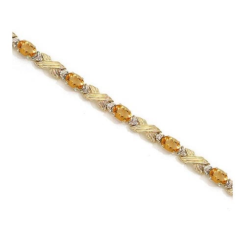 Citrine and Diamond XOXO Link Bracelet 14k Yellow Gold 6.65ctw: CENTER STONE; Citrine CENTER STONE CLARITY; CENTER STONE COLOR; Orange CENTER STONE SETTING; Prong SIDE STONE CLARITY; SI SIDE STONE COLOR; H SIDE STONE SETTING; Prong ctw OF SIDE STONE: 0.05 SIDE STO