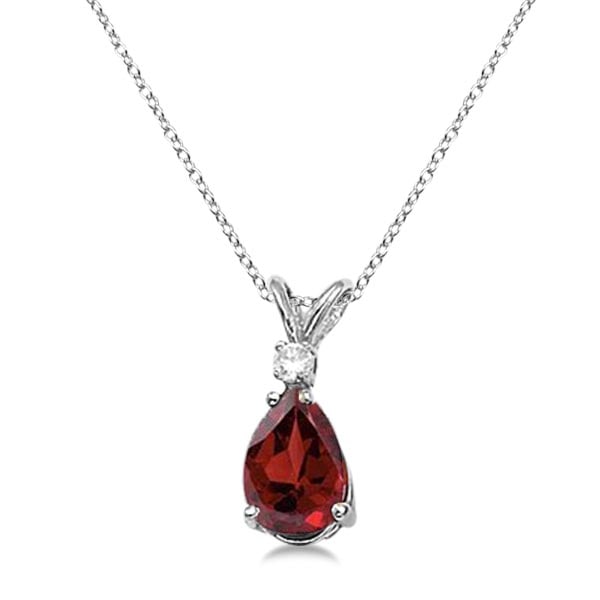 Pear Garnet and Diamond Solitaire Pendant Necklace 14k White Gold: CENTER STONE; Garnet CENTER STONE CLARITY; CENTER STONE COLOR; CENTER STONE SETTING; Prong SIDE STONE CLARITY; SI SIDE STONE COLOR; I-J SIDE STONE SETTING; Prong ctw OF SIDE STONE: 0.05 SIDE STONE QUA