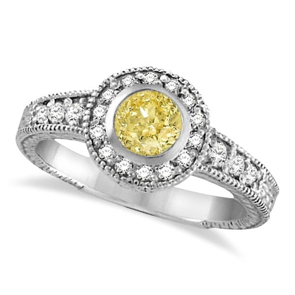 Yellow Canary and White Diamond Antique style Style Ring 14K W Gold 1.80ctw: CENTER STONE; Diamond CENTER STONE CLARITY; SI CENTER STONE COLOR; Yellow CENTER STONE SETTING; Bezel SIDE STONE CLARITY; SI SIDE STONE COLOR; J-K SIDE STONE SETTING; Prong ctw OF SIDE STONE: 0.35 SID