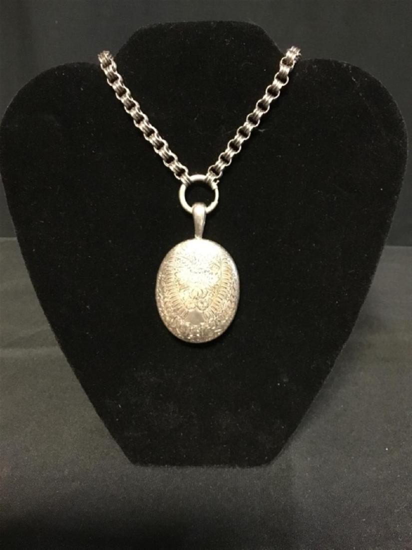Silver necklace with a locket five proof marks: Silver necklace with a locket five proof marks Silver necklace with a locket five proof marks Believed to be coin silver
