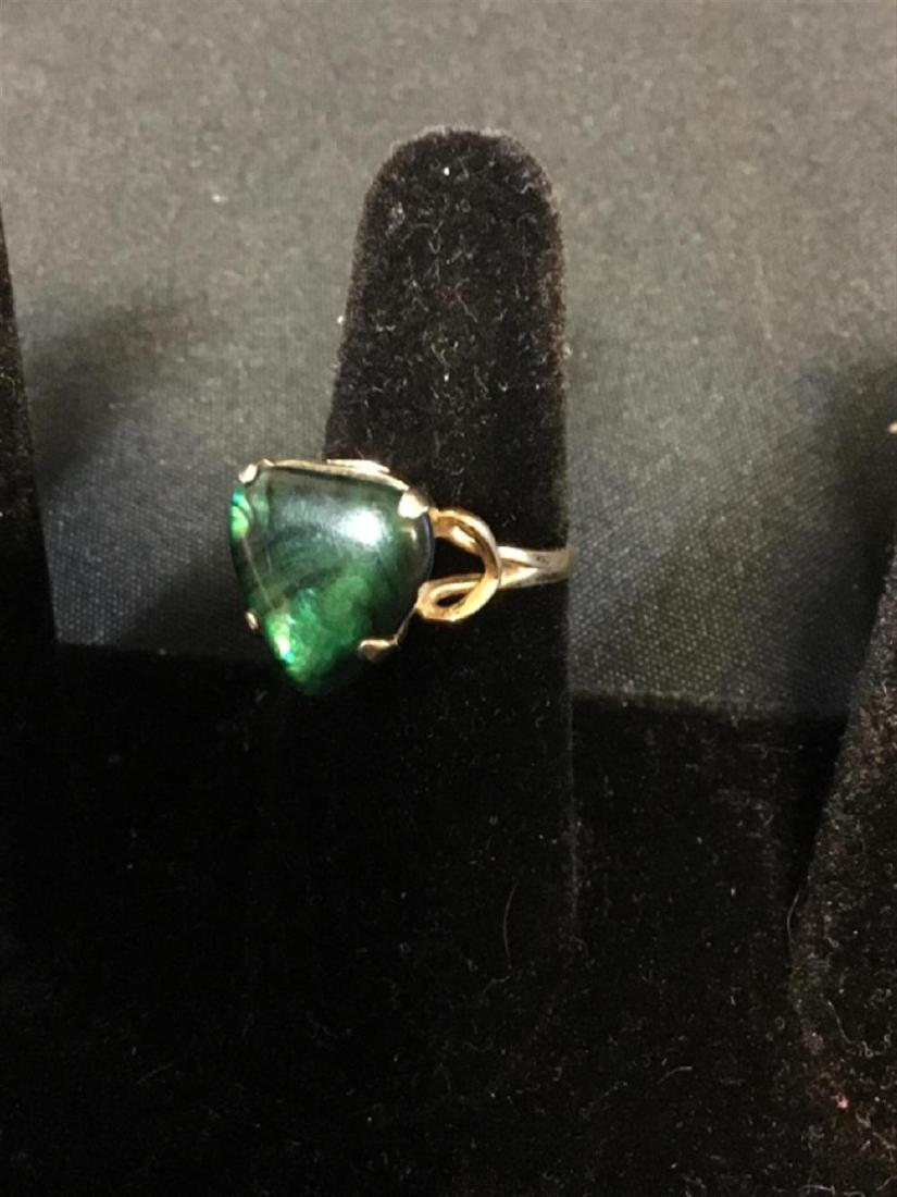 Gold toned green ring (1 of 1)