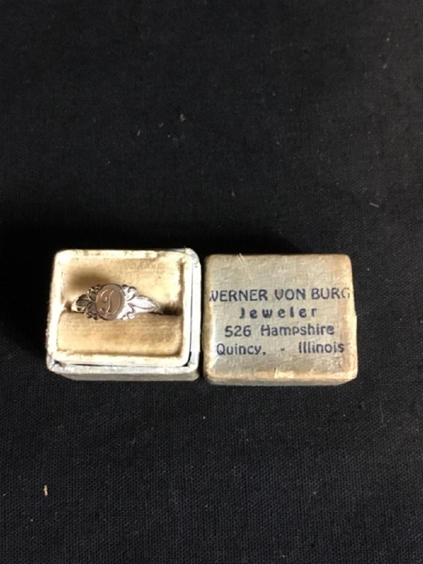 10 karat white gold baby ring with the engraved: 10 karat white gold baby ring with the engraved on it 1 g total weight 10 karat white gold baby ring with the engraved on it 1 g total weight