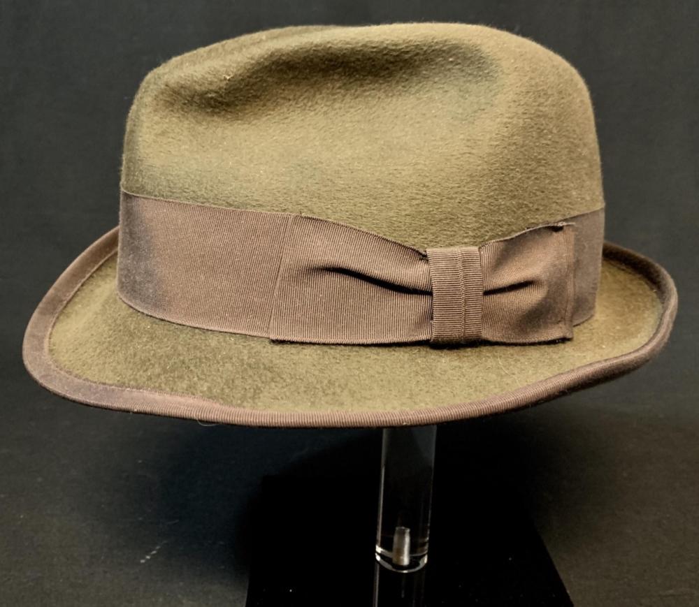 The Adjustment Bureau (2011) - Screen Worn Hat - Lot A: The Adjustment Bureau (2011) - Screen Worn Hat - Lot A. Original screen used hat worn by a main character in the romantic thriller film "The Adjustment Bureau" (2011). where, the affair between a poli