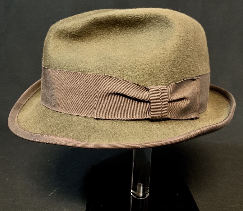 The Adjustment Bureau (2011) - Screen Worn Hat - Lot A: The Adjustment Bureau (2011) - Screen Worn Hat - Lot A. Original screen used hat worn by a main character in the romantic thriller film 'The Adjustment Bureau' (2011). where, the affair between a poli