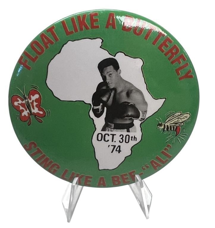 Ali (2001) - Ali Boxing Match Badge: Ali (2001) - Ali Boxing Match Badge.Original Ali boxing match badge worn by a fan in the Michael Mann directed biographical sports drama film 'Ali' (2001).The film focuses on ten years in the life of 
