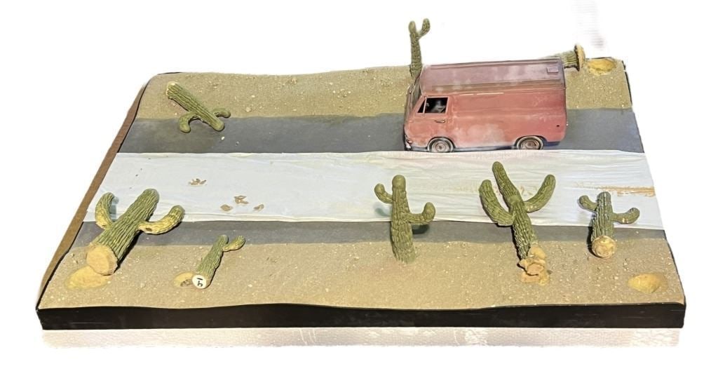 Men in Black (1997) - Alien Van & Cactus Miniatures: Men in Black (1997) - Alien Van & Cactus Miniatures.Measuring 22" x 16".Used in the beginning of the film where the camera follows a dragonfly and flies into the windscreen of the van. Pulled by cable