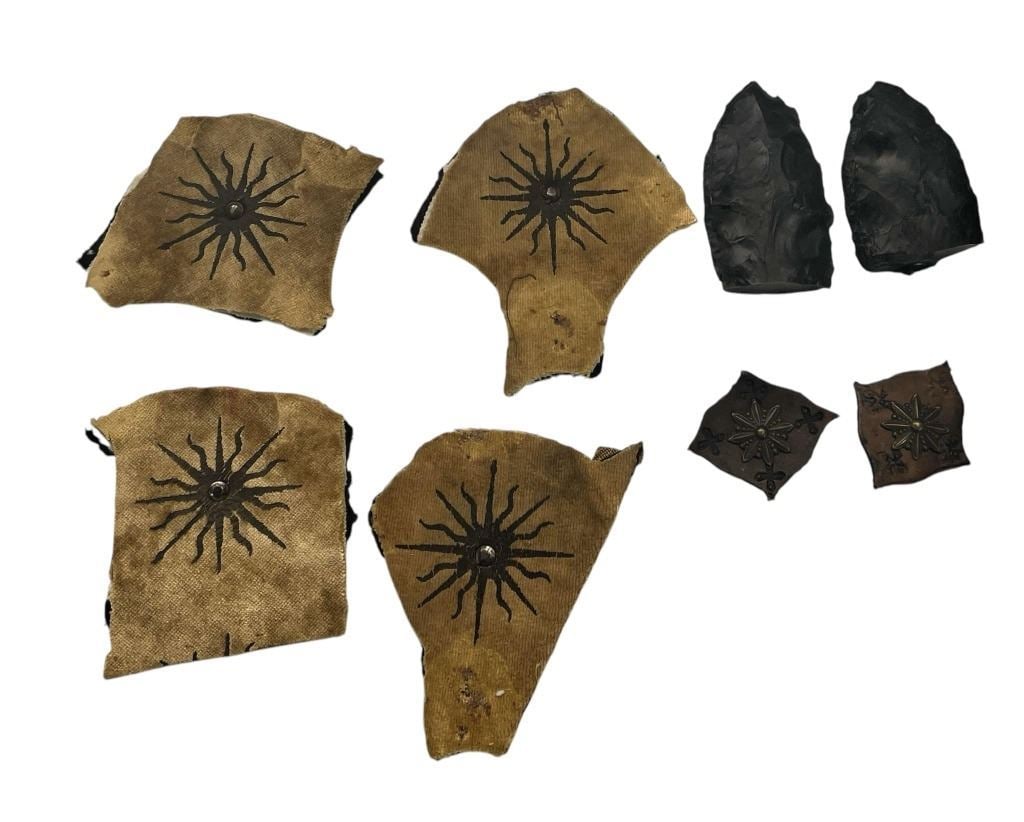 Game of Thrones (2011-2019) - Dorne Guard Costume Swatches, Leather Ornaments and Dragon Glass: Game of Thrones (2011-2019) - Dorne Guard Costume Swatches, Leather Ornaments and Dragon Glass.Original Dorne Guard costume swatches and leather ornaments used in the production of the fantasy drama t