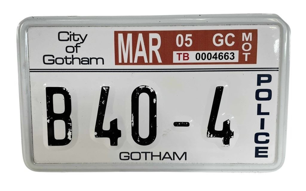 Batman Begins (2005) - Gotham Police Bike License Plate: Batman Begins (2005) - Gotham Police Bike License Plate.Original Gotham police bike license plate used in the Christopher Nolan directed superhero film 'Batman Begins' (2005), where, after training wi