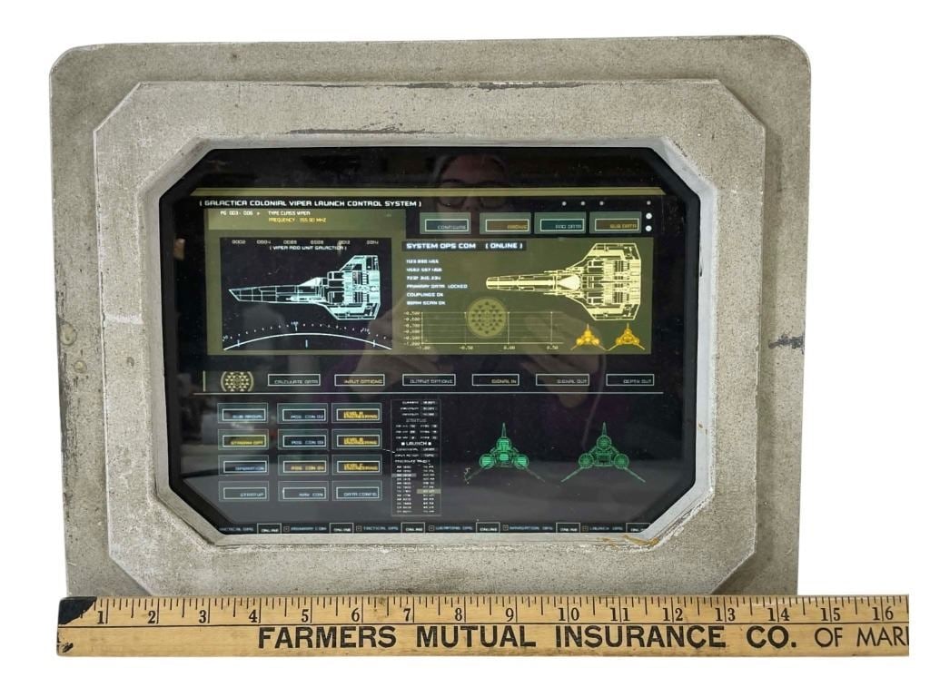Battlestar Galactica (2004 - 2009) - CIC Translight and Frame: Battlestar Galactica (2004 - 2009) - CIC Translight and Frame.Measuring 14" x 11 1/2".Original CIC translight and frame used in the science fiction television series 'Battlestar Galactica' (2004 - 200