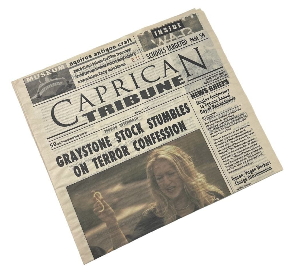 Battlestar Galactica Caprica (2009-2010) - Screen Used Caprican Newspaper: Caprica (2009-2010) - Screen Used Caprican Newspaper.Original screen used prop "Caprican" Newspaper with Amanda Graystone (Paula Malcomson) on the front, used on the science fiction drama television