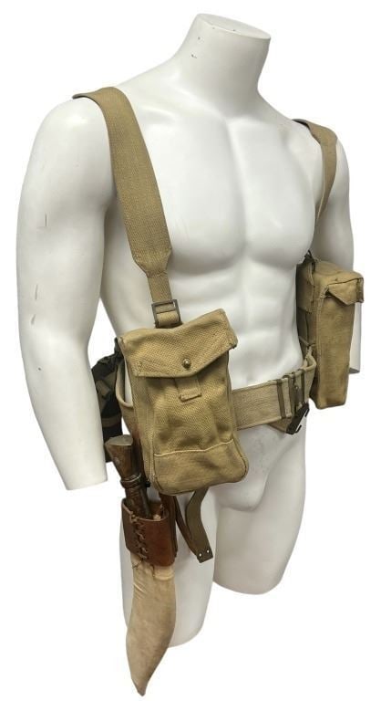Seven Years in Tibet (1997) - British Soldier Gear: Seven Years in Tibet (1997) - British Soldier Gear.Made by the propmaster, a British Indian military gear (real gear from the period marked 1943) consisting of a canteen, webbing, a real metal Kukri w