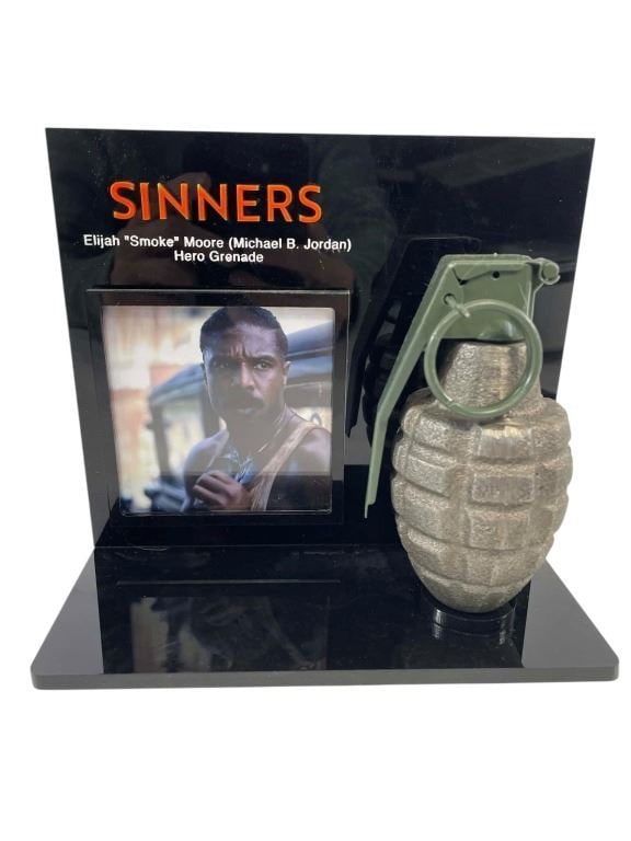 Sinners (2025) - Michael B. Jordan (Elijah "Smoke" Moore) Hero Hand Grenade: Sinners (2025) - Michael B. Jordan (Elijah "Smoke" Moore) Hero Hand Grenade.Made of metal with.Comes with a custom made acrylic display.Original hero hand grenade used by "Elijah "Smoke" Moorein", pla