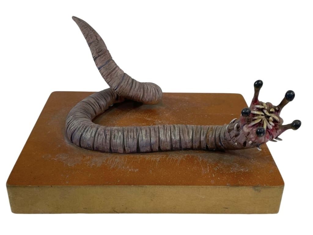Evolution (2001) (Phil Tippett Collection) - Alien Worm Monster Painted Maquette: Evolution (2001) (Phil Tippett Collection) - Alien Worm Monster Painted Maquette.Measuring 6 1/2" x 8" x 4".Made of resin with wood base.Original painted maquette for the "Alien Worm Monster" used in