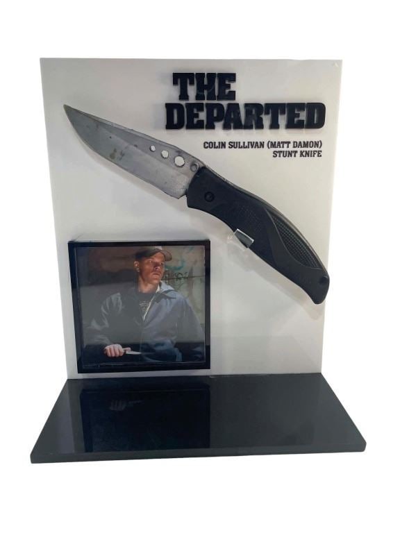 The Departed (2006) - Colin (Matt Damon) Knife With Custom Display: The Departed (2006) - Colin (Matt Damon) Knife With Custom Display.Made of rubber.Measuring 3" x 7" x 8 1/4".Original stunt knife used by "Colin", played by Matt Damon in the production of the Martin 