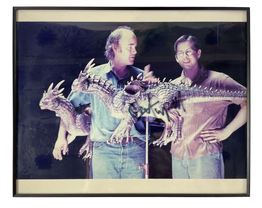 DragonHeart (1996) - Phil Tippett Signed Production Still - Lot B: DragonHeart (1996) - Phil Tippett Signed Production Still - Lot B.Measuring 8" x 10".Photo is framed and Phil Tippett has signed the outside of the glass.Original photo that hung in Phil Tippett studi