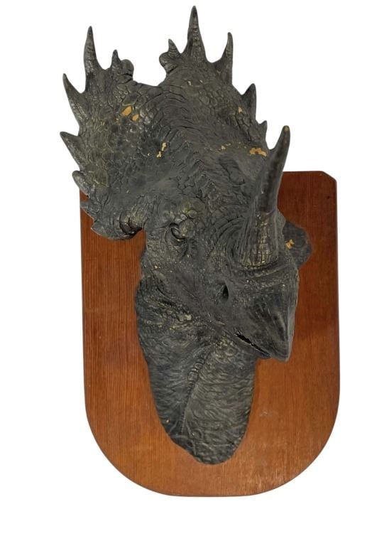 Phil Tippett Collection - Pete Konig Custom Made Dinosaur Model: Phil Tippett Collection - Pete Konig Custom Made Dinosaur Model.Measures 6[x=#8221/] x 7[x=#8221/] x 10[x=#8221/].Back is signed by Pete Konig.Made of resin and wood.This was a custom made piece gifte