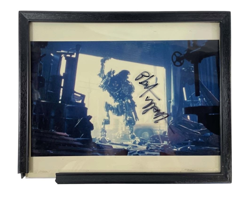 RoboCop 2 (1990) - Phil Tippett Signed Production Still - Lot A: RoboCop 2 (1990) - Phil Tippett Signed Production Still.Measuring 8" x 10".Photo is framed and Phil Tippett has signed the outside of the glass.Original photo that hung in Phil Tippett studio from