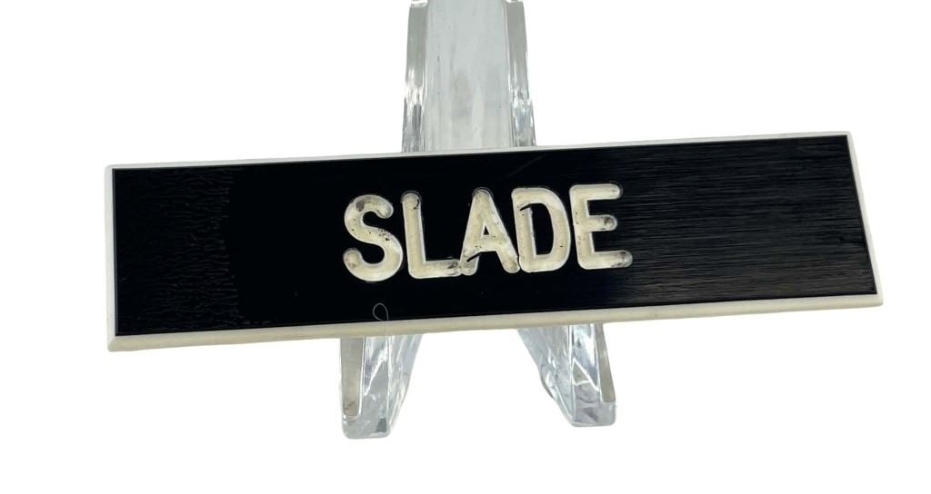 Scent of a Woman (1992) - Al Pacino (Lt. Col. Frank Slade) Name Badge: Scent of a Woman (1992) - Al Pacino (Lt. Col. Frank Slade) Name Badge.Original name badge used by "Lt. Col. Frank Slade", played by Al Pacino in the Martin Brest directed drama film 'Scent of a