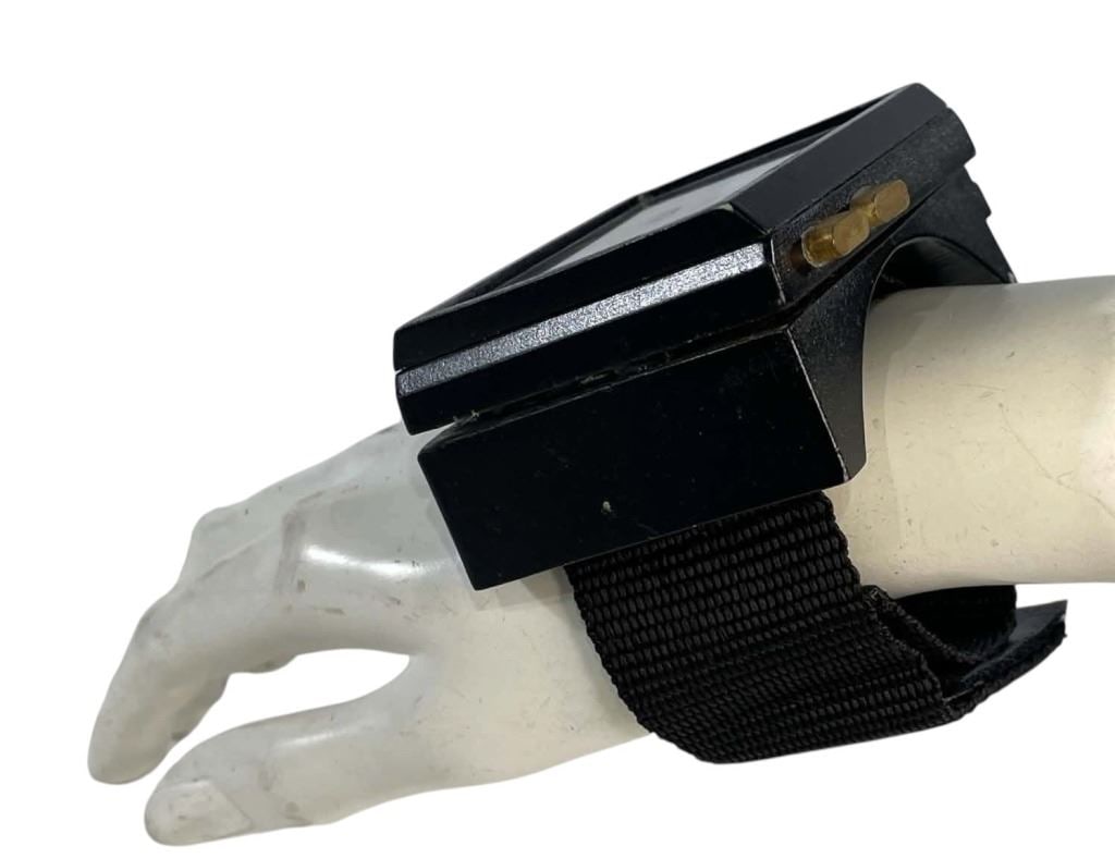 Star Wars - Solo: A Star Wars Story (2018) - Yacht Security Hero Light-Up Wrist Comlink: Solo: A Star Wars Story (2018) - Yacht Security Hero Light-Up Wrist Comlink.Original prop wrist comlink used by a yacht ship security member on the production of the Ron Howard directed science fictio