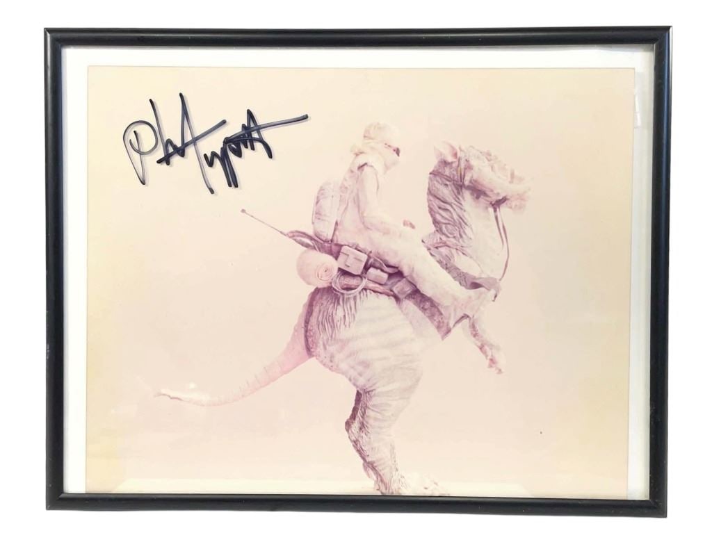 Star Wars - The Empire Strikes Back (1980) - Phil Tippett Signed Production Still - Lot D: Star Wars - The Empire Strikes Back (1980) - Phil Tippett Signed Production Still - Lot D.Measuring 11 1/2" x 12".Photo is framed and Phil Tippett has signed the outside of the glass.Original photo