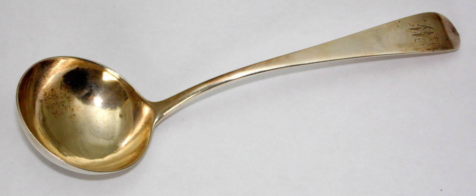 Georgian Sterling Silver Ladle by Stephen Adams I: Georgian Sterling Silver Ladle by Stephen Adams I. Hallmarked London 1793. Monogrammed W. 1.7 ozs. Length 7 inches.