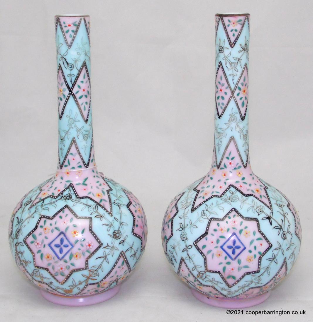 A Pair of Thomas Webb Enameled Art Glass Vases: A Pair of Thomas Webb Opaline Enameled Art Glass Vases.Late 19th Century. Hand painted enamel Moroccan or Persian pattern decoration in colors of blues, greens, pink and black on duck egg blue ground.
