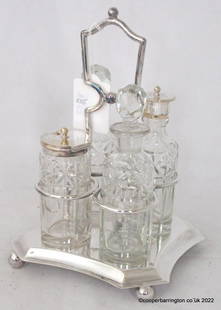 Antique Sheffield Silver Plated 4 Bottle Cruet Set: Antique Sheffield Silver Plated 4 Bottle Cruet Set and Stand.