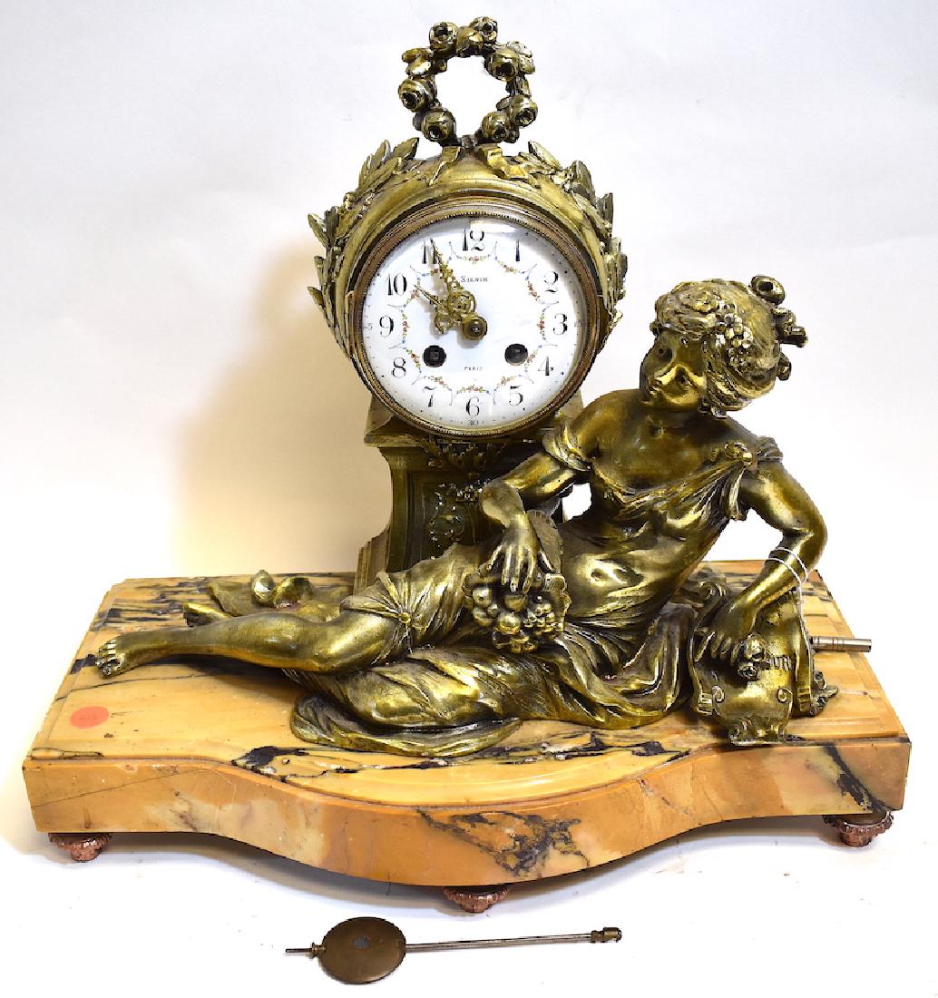 Ca. 1900 French dore bronze mantle clock with reclining: Ca. 1900 French dore bronze mantle clock with reclining woman on amber marble base 16"h x 17"w x 9"d