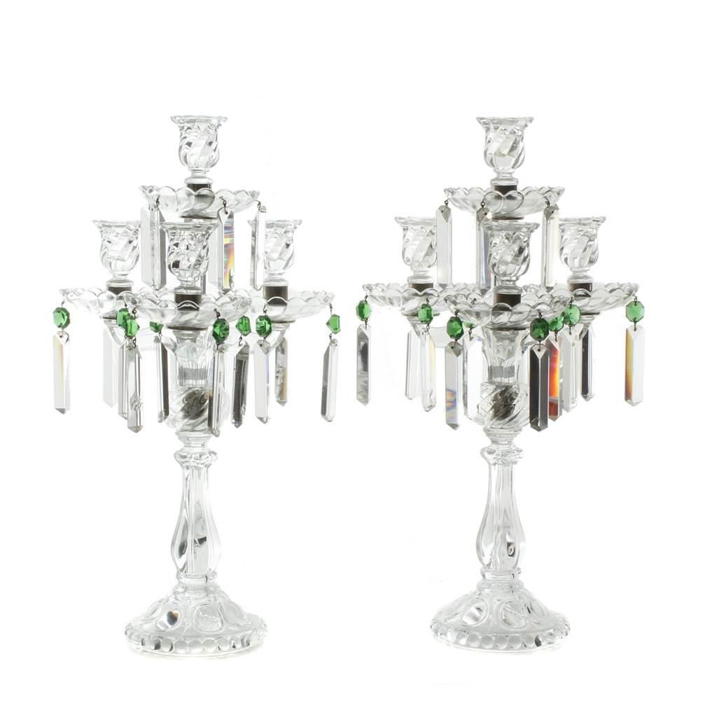 PAIR OF FRENCH CANDELABRA, 20TH CENTURY.: Moulded and carved crystal decorated with hanging prisms.Four lights and three arms. Some chipping.Height: 50 cm.