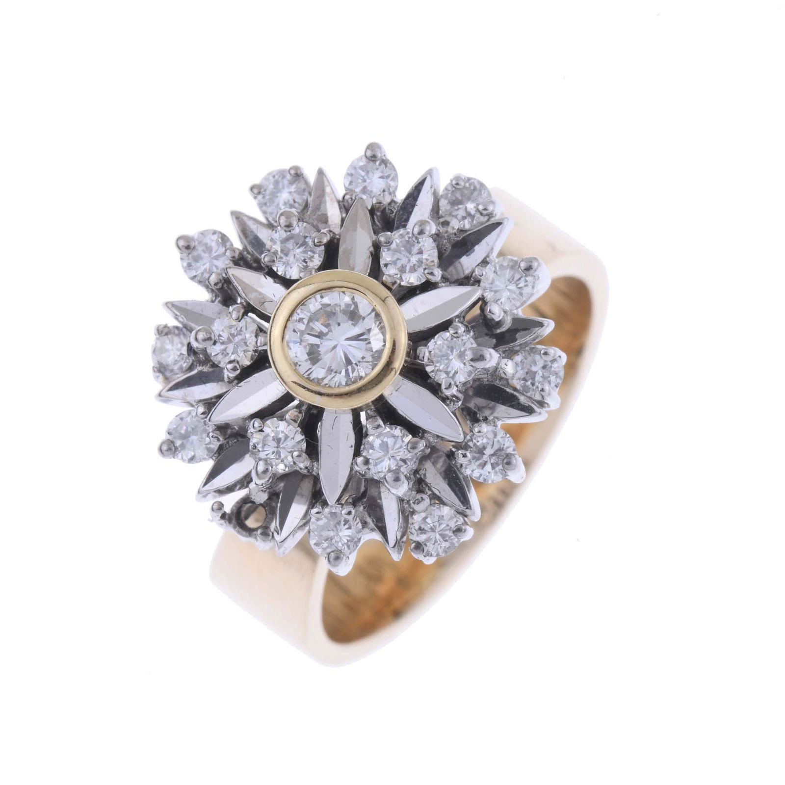 TWO-TONE ROSETTE RING WITH DIAMONDS.: 18kt yellow gold with 18kt white gold views with 0.70 ct brilliant cut diamonds.One small diamond is missing.9.2 grs