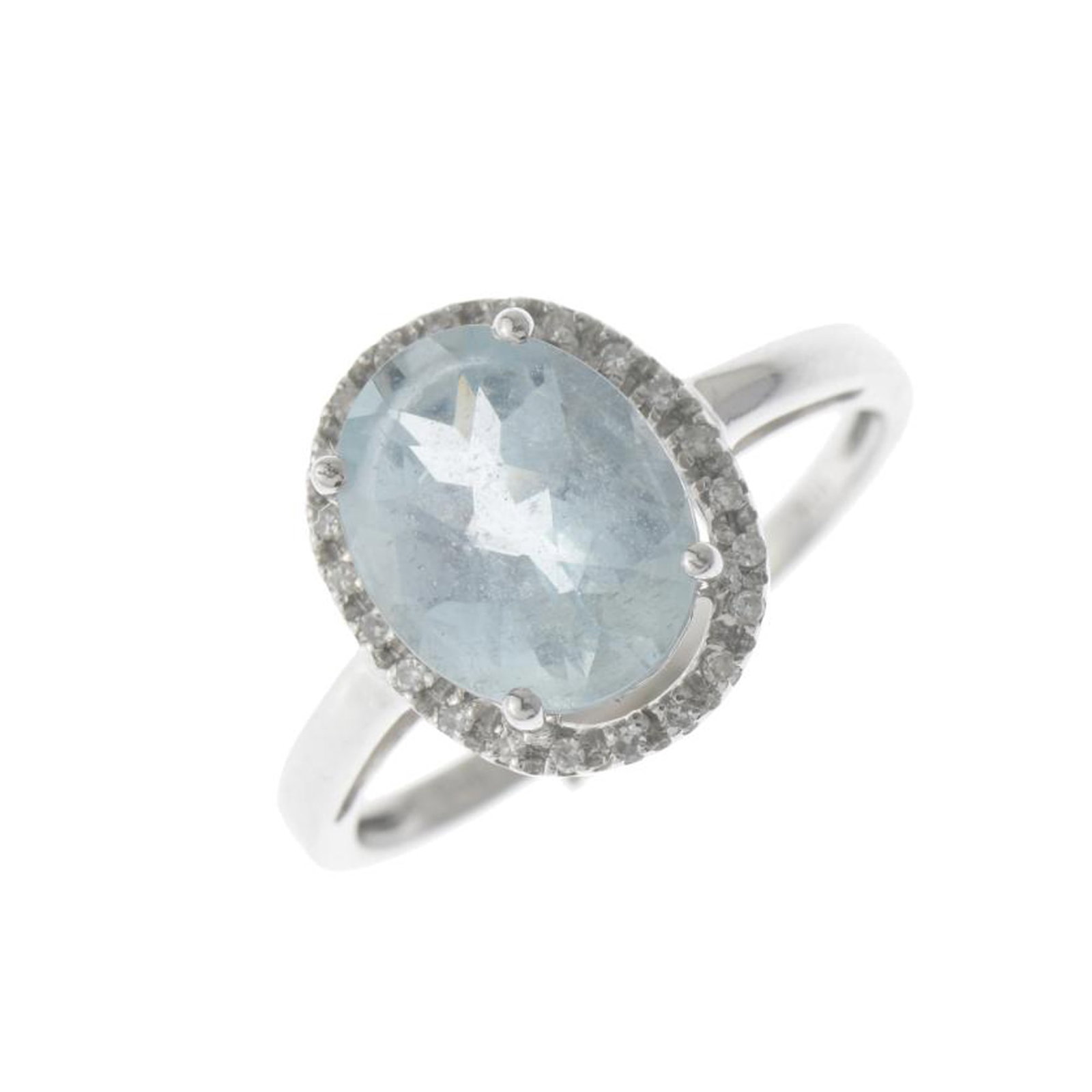 TOURMALINE ROSETTE RING: 18kt white gold with oval cut tourmaline and brilliant cut diamonds. Size: 12/52. Weight: 2.8 gr.