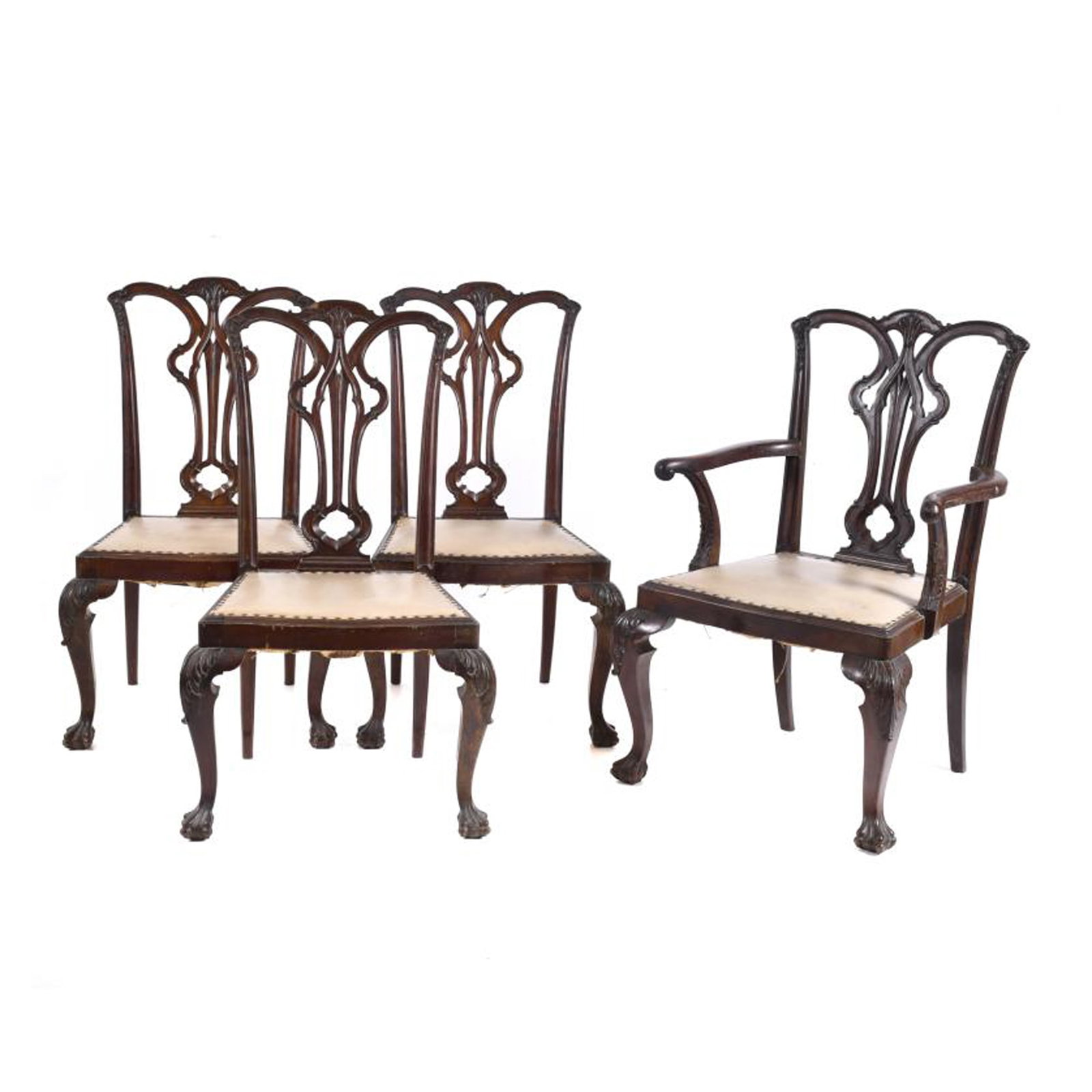 AFTER MODELS BY THOMAS CHIPPENDALE (1718 - 1779). Set of three chairs and an armchair, 20th century.: Mahogany wood. Studded imitation leather seat. Wear and tear, cracks and some breaks. Armchair 101 x 66 x 61 cm; chairs 102 x 61 x 54 cm.