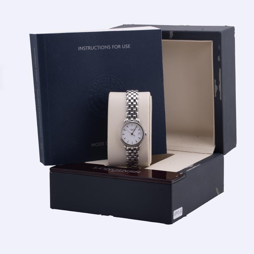 LONGINES. Women's watch. Flagship.: LONGINES. Dial of 23 mm. Quartz movement. Made of steel. In running order, but without batteries. It comes with box, a double box and instructions.