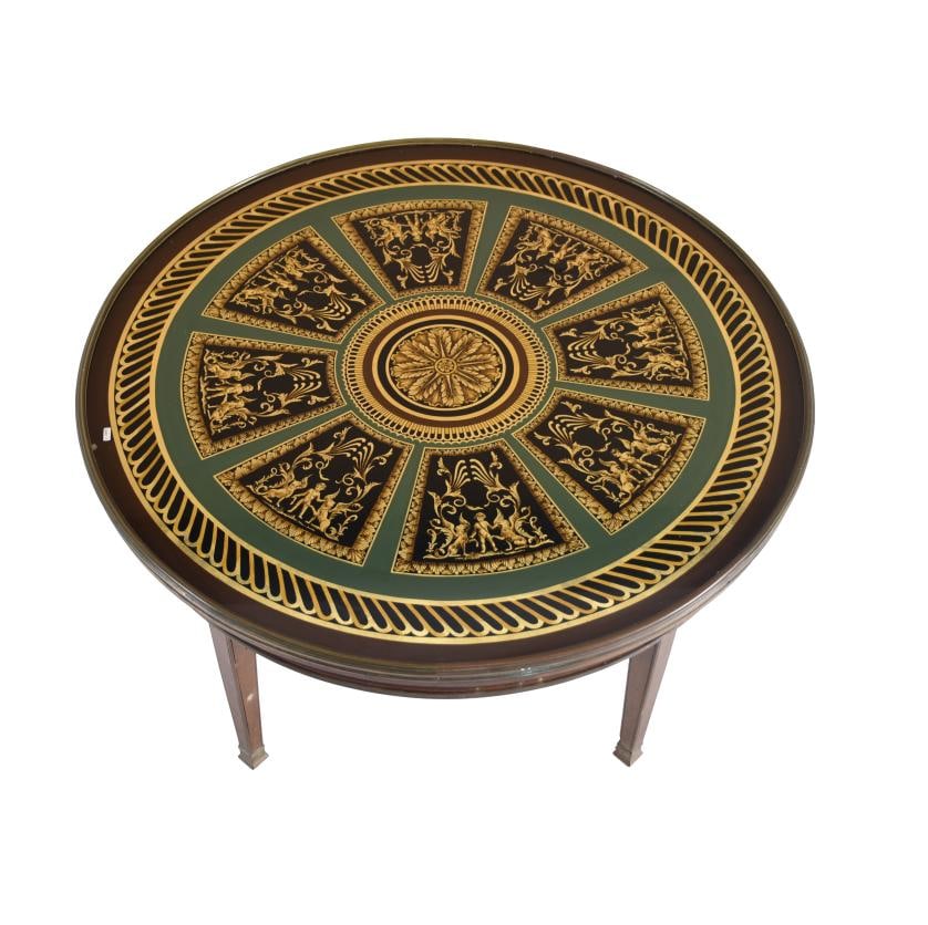 AFTER MODELS BY JEAN BÉRAIN (1640 - 1711). Low coffee table.: Wooden structure with brass filleting decoration on the waist and feet. Top decorated with motifs inspired by Jean Bérain's designs and protected by glass. Wear, flaws on the filleting and holes caus