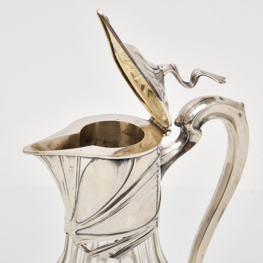Art Noveau decanter, circa 1900.: Silver and crystal. 26 x 25 x 23 cm approx.