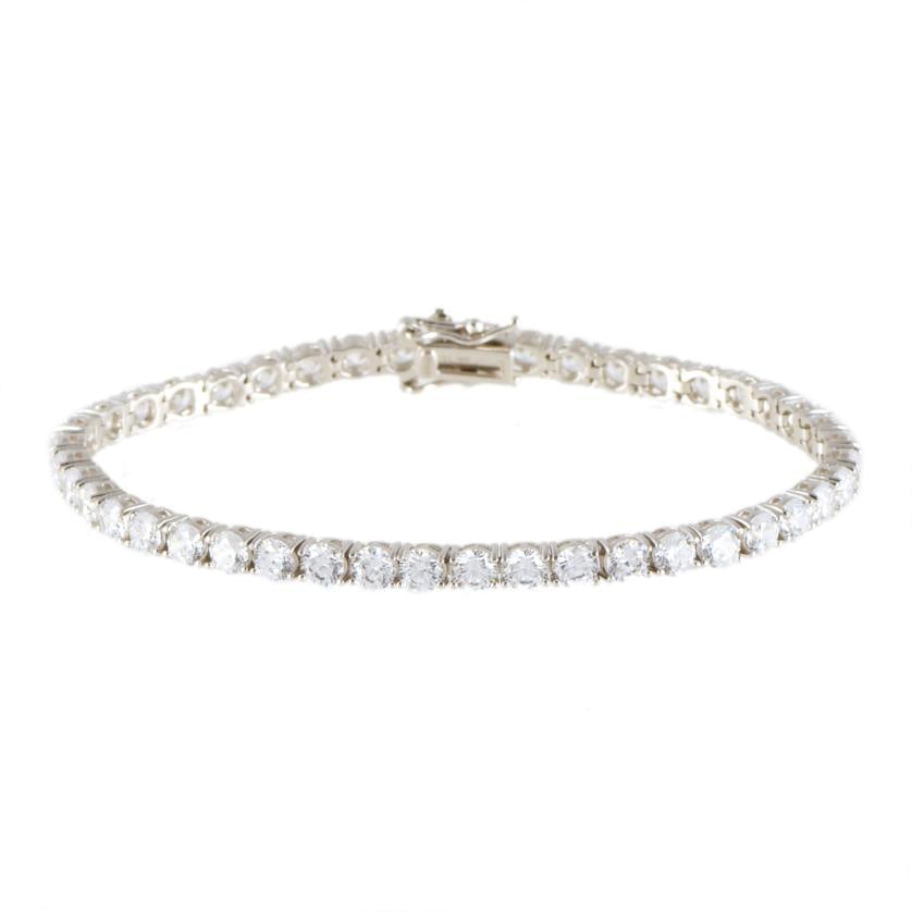 Riviére bracelet with zircons.: 925 silver and brilliant cut zircons. Double security box clasp. Length when open: 18.5 cm.