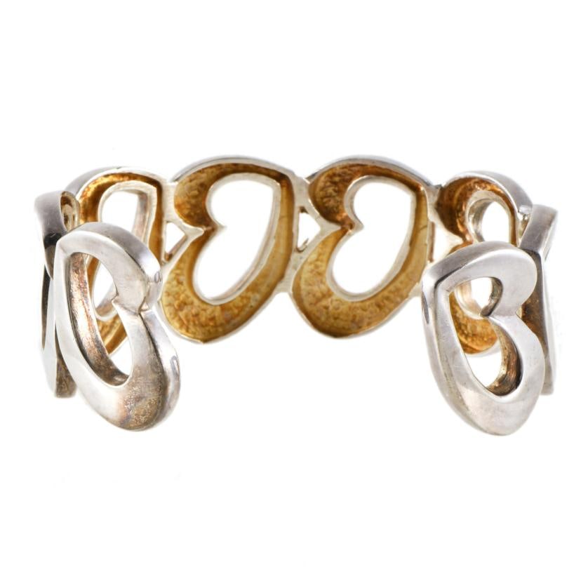 Rigid bracelet with heart shapes. (1 of 1)