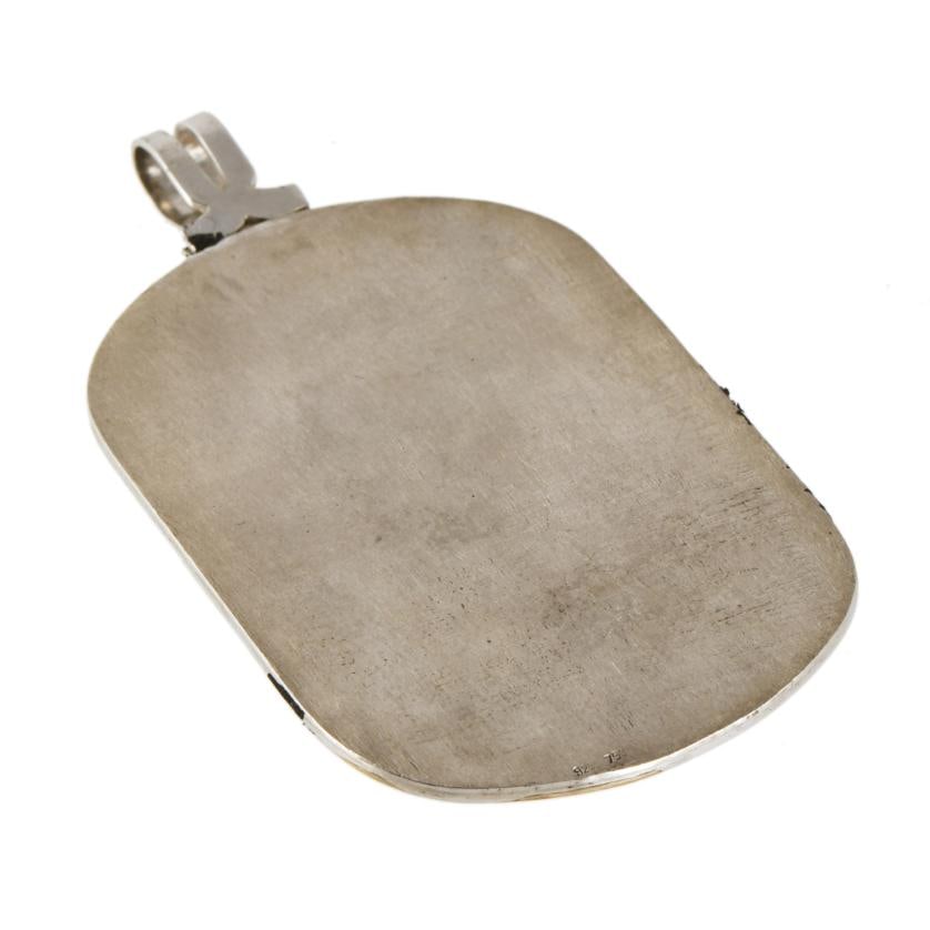 Large pendant with natural chalcedony forming a landscape, with diamonds.: Handcrafted, in 925 silver with 18 kt yellow gold accents. Brilliant cut diamonds. 80 x 43 mm.