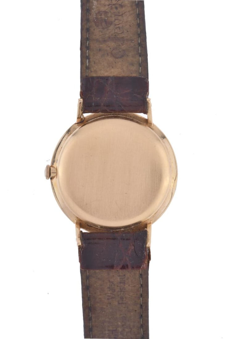 UNIVERSAL GENEVE. Wristwatch. (1 of 4)