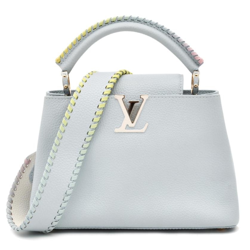 LOUIS VUITTON. Capucines BB bag.: Special edition. In sky blue Taurillon leather in pastel shades. Leather-lined monogram. Divided interior with a zip pocket and a flat pocket. With four protective metal rivets on the base. The origin