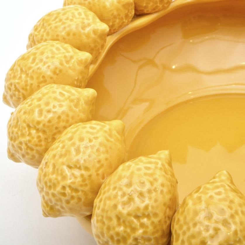 AFTER MODELS BY BORDALLO PINHEIRO. Pair of centrepieces.: Enamelled ceramic. Slight signs of wear and tear. Approx. 14 x 40 cm diam.