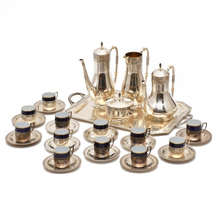 MASRIERA I CARRERAS. Coffee and tea set, Noucentista style, mid 20th century.: Silver and porcelain. Wear and tear. 6.5 x 8 x 5.5 cm approx. (the smallest item); 27 x 21.5 x 12 cm (the largest item). 5,740 gr