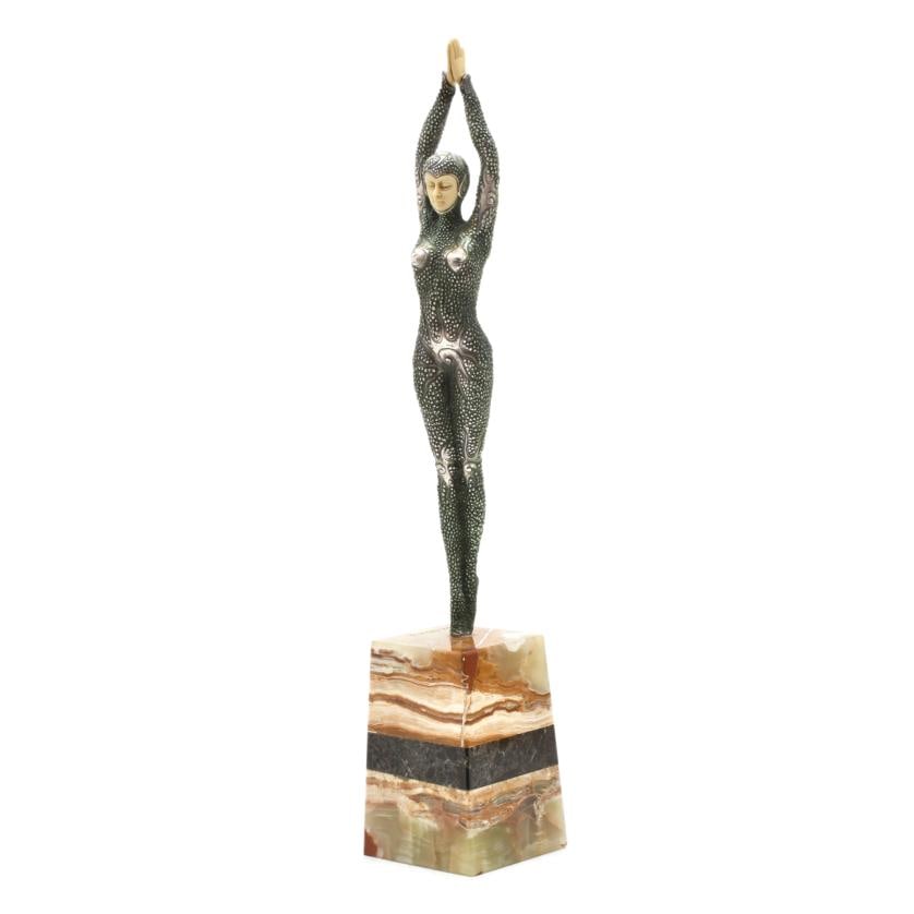 AFTER CHIPARUS MODELS, Starfish: Bronze and ivorine, with onyx stand. Signature on the stand. Approx. 48 x 8.5 x 8.5 cm.
