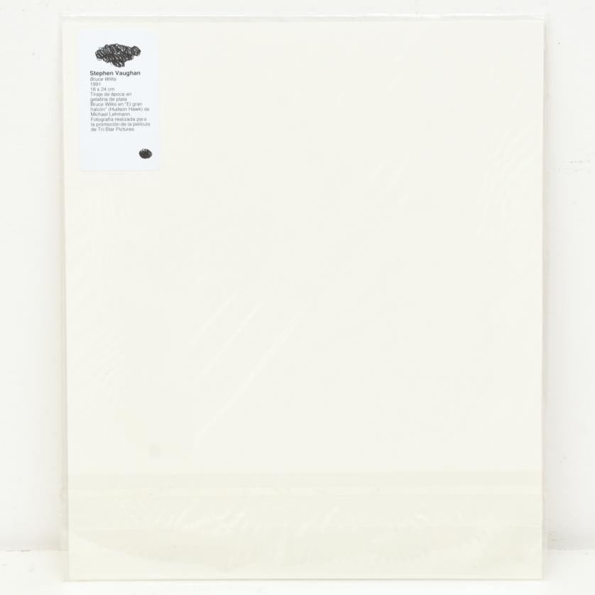 Stephen Vaughan. Bruce Willis. 1991.: Vintage silver gelatin print. Bruce Willis in Michael Lehmann's ‘Hudson Hawk’. Photograph taken for the promotion of the Tri-Star Pictures film. 24 x 18 cm (photo).