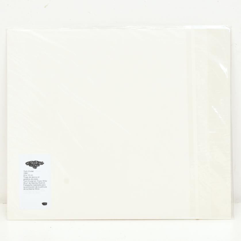 Tom Cruise. 1990.: Vintage silver gelatin print. Tom Cruise in ‘Eyes Wide Shut’ by Stanley Kubrick. Photograph taken for the promotion of the Warner Bros. film. 18 x 24 cm (photo).