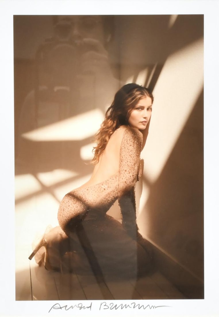 Chromogenic print on paper. Laetitia Casta, 2004.: Chromogenic printing on paper. Photograph signed by the artist at the bottom. Literature: Elle (France). August 2004. Cover. Arnaud Bauman, photographer, portraitist, cameraman and director of photogr